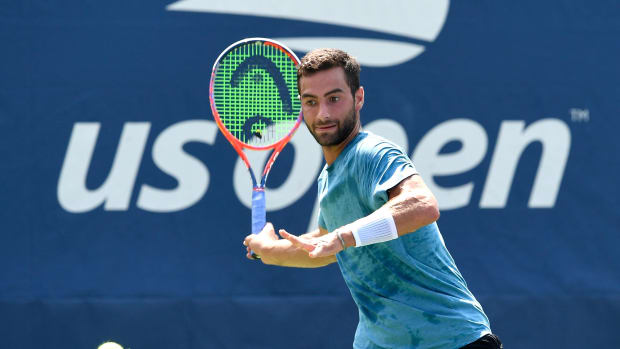 noah-rubin-behind-racquet.jpg